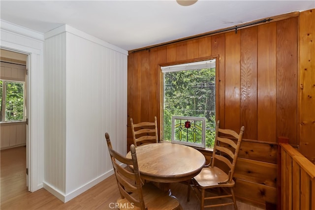 425 Blue Jay Canyon Rd, Blue Jay, CA 92317 - dining area with light wood finished floors, plenty of natural light, and wooden walls