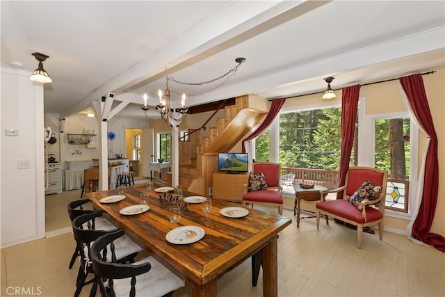 425 Blue Jay Canyon Rd, Blue Jay, CA 92317 - dining space with a chandelier, stairway, light wood-style flooring, and beamed ceiling