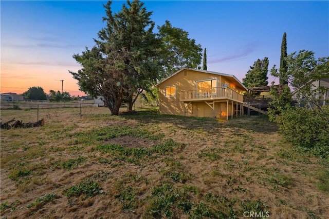 14526 Hardtree Dr, Lake Hughes, CA 93532 - yard at dusk with a deck