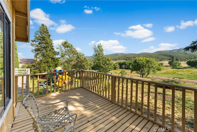 14526 Hardtree Dr, Lake Hughes, CA 93532 - wooden terrace featuring a playground and a mountain view