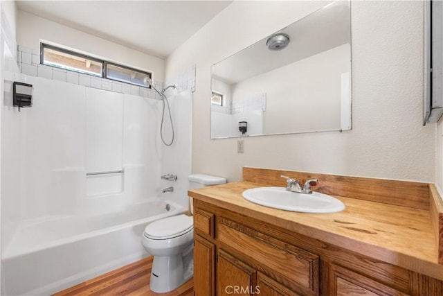 14526 Hardtree Dr, Lake Hughes, CA 93532 - full bathroom with vanity, shower / bathtub combination, and wood finished floors