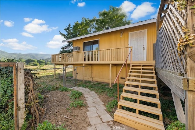 14526 Hardtree Dr, Lake Hughes, CA 93532 - back of property featuring stairway, a deck with mountain view, and a gate