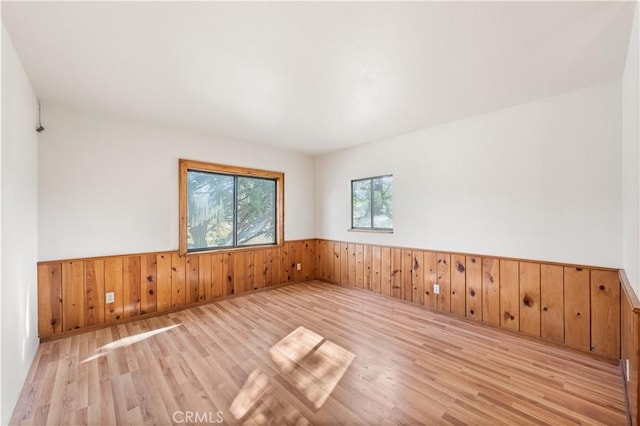 14526 Hardtree Dr, Lake Hughes, CA 93532 - spare room with wood finished floors, wainscoting, and wood walls