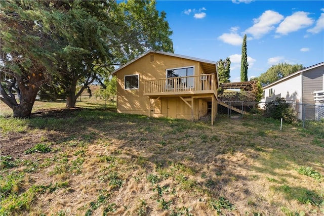 14526 Hardtree Dr, Lake Hughes, CA 93532 - rear view of property featuring a deck, a fenced backyard, and stairway