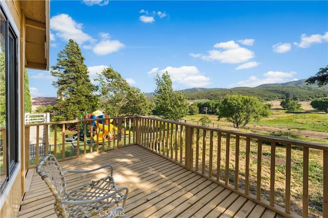 14526 Hardtree Dr, Lake Hughes, CA 93532 - wooden deck with a playground and a mountain view