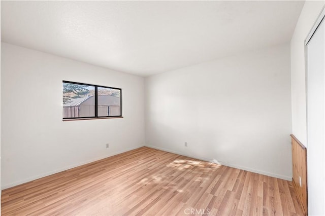 14526 Hardtree Dr, Lake Hughes, CA 93532 - spare room featuring light wood-type flooring and baseboards