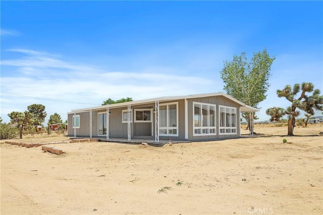 4369 Amador Rd, Phelan, CA 92371 - back of house featuring a sunroom