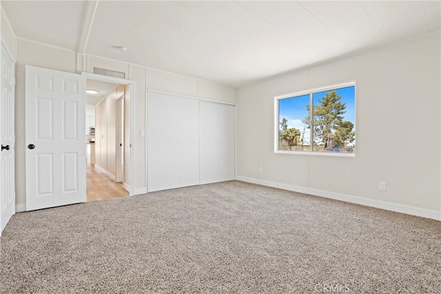 4369 Amador Rd, Phelan, CA 92371 - unfurnished bedroom featuring carpet flooring and a closet