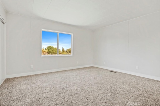 4369 Amador Rd, Phelan, CA 92371 - carpeted empty room with baseboards