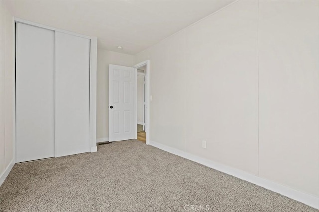 4369 Amador Rd, Phelan, CA 92371 - unfurnished bedroom featuring carpet flooring and a closet