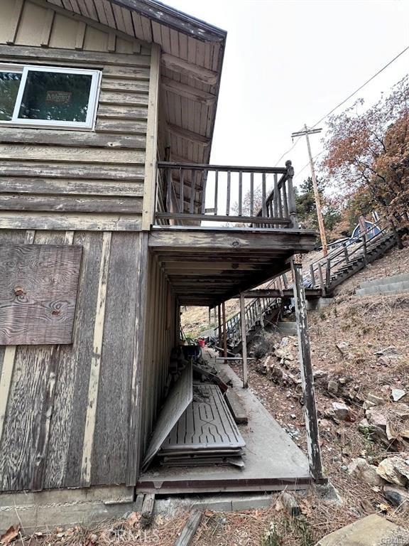 31749 Hilltop Dr, Running Springs, CA 92382 - view of home's exterior with stairway and a deck