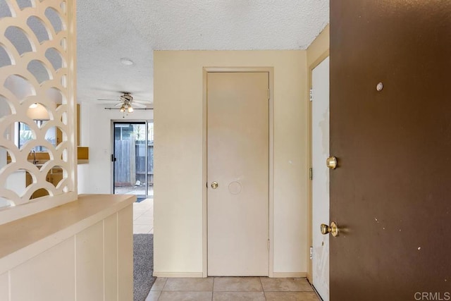 1608 Grandview St, Oceanside, CA 92054 - corridor featuring light tile patterned floors and a textured ceiling