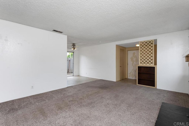 1608 Grandview St, Oceanside, CA 92054 - empty room featuring carpet floors, a textured ceiling, and a ceiling fan