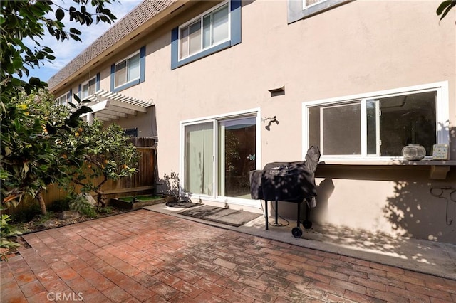 4161 Elizabeth Ct, Cypress, CA 90630 - rear view of property with stucco siding, a patio area, and a pergola
