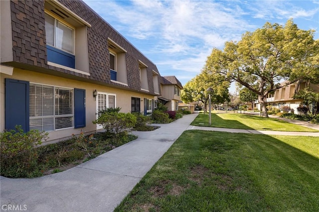 4161 Elizabeth Ct, Cypress, CA 90630 - view of community featuring a yard and a residential view