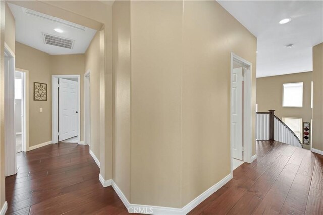 28089 Promontory Ln, Valencia, CA 91354 - hall featuring an upstairs landing and dark wood finished floors