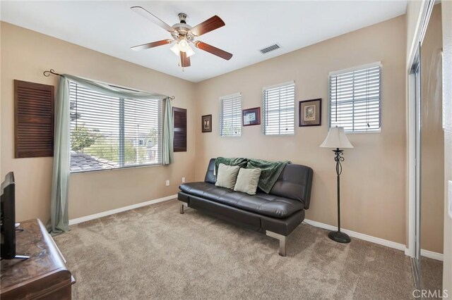 28089 Promontory Ln, Valencia, CA 91354 - sitting room featuring healthy amount of natural light, a ceiling fan, and carpet