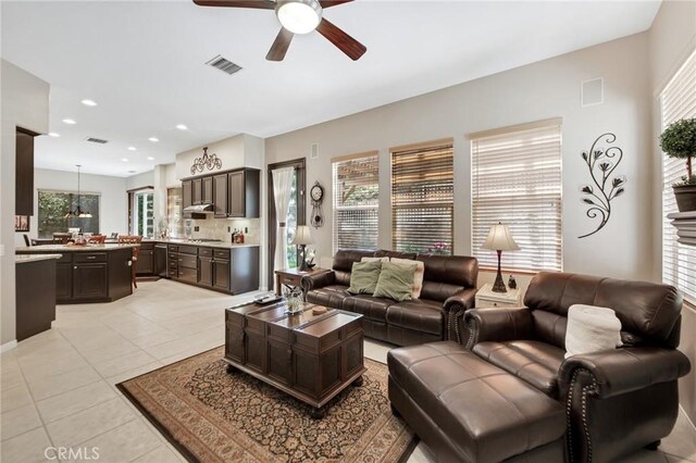 28089 Promontory Ln, Valencia, CA 91354 - living area with a ceiling fan, light tile patterned floors, and recessed lighting