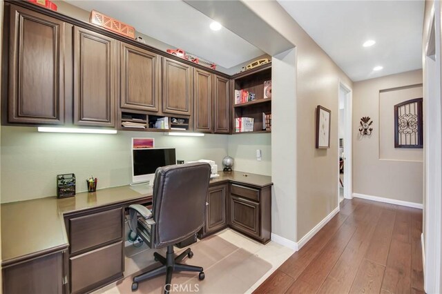 28089 Promontory Ln, Valencia, CA 91354 - office area with built in desk, light wood-style flooring, and recessed lighting
