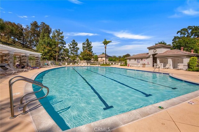 28089 Promontory Ln, Valencia, CA 91354 - community pool featuring a patio area