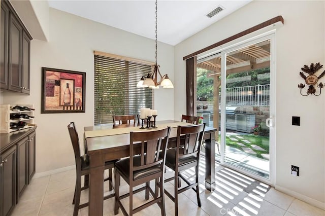 28089 Promontory Ln, Valencia, CA 91354 - dining room with a chandelier and light tile patterned floors