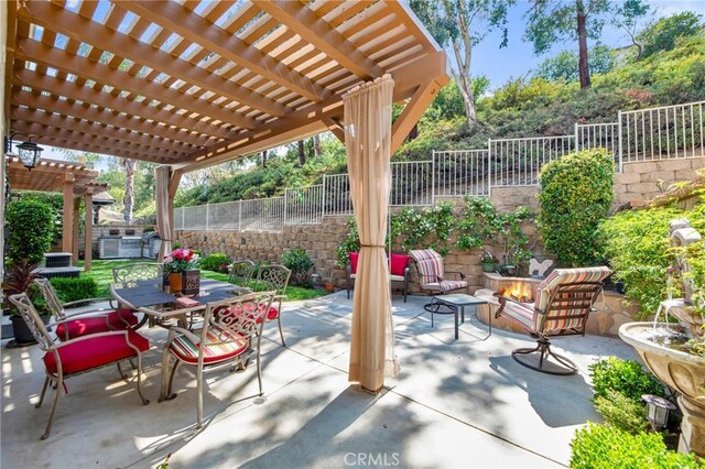 28089 Promontory Ln, Valencia, CA 91354 - fenced backyard with a patio, a jacuzzi, outdoor dining area, and a pergola