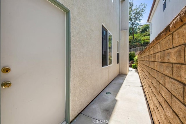28089 Promontory Ln, Valencia, CA 91354 - view of property exterior featuring stucco siding