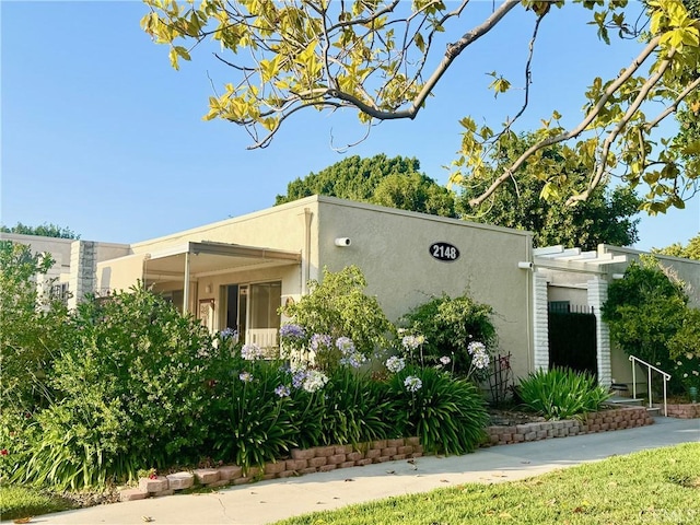 2148 Ronda Granada Unit A, Laguna Woods, CA 92637 - view of property exterior with stucco siding