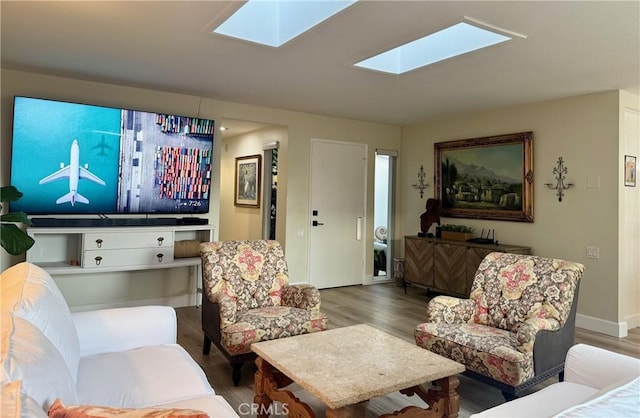 2148 Ronda Granada Unit A, Laguna Woods, CA 92637 - living area featuring wood finished floors and a skylight