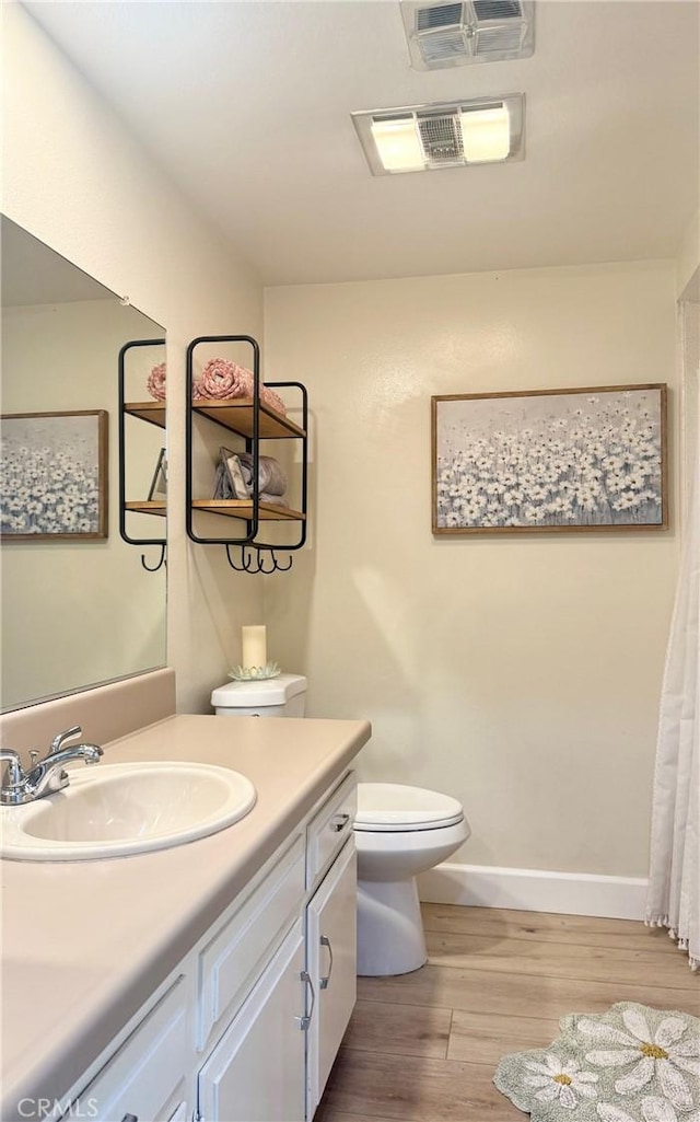 2148 Ronda Granada Unit A, Laguna Woods, CA 92637 - full bathroom featuring wood finished floors and vanity