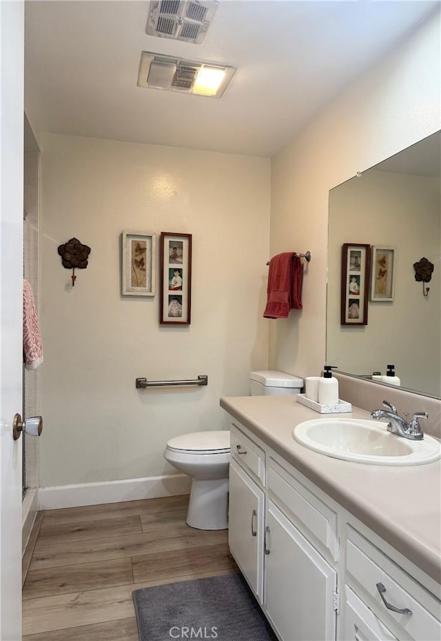 2148 Ronda Granada Unit A, Laguna Woods, CA 92637 - full bath featuring vanity, wood finished floors, and an enclosed shower