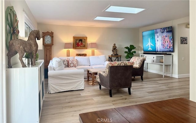 2148 Ronda Granada Unit A, Laguna Woods, CA 92637 - living room with a skylight and light wood finished floors