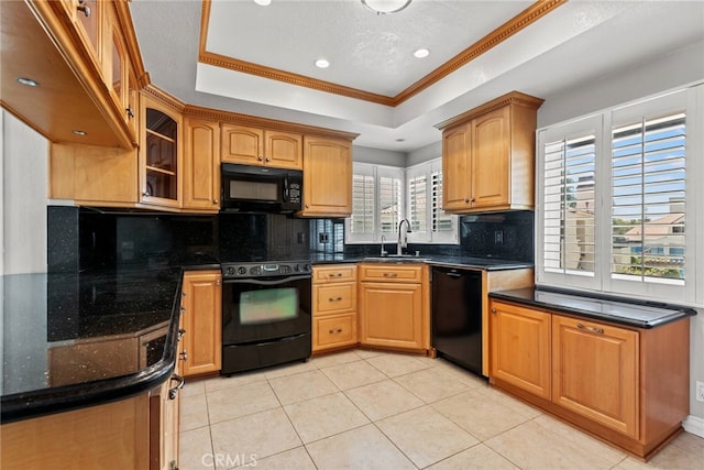 3211 Anne Cir Unit Ci102, Huntington Beach, CA 92649 - kitchen with black appliances, a tray ceiling, decorative backsplash, crown molding, and light tile patterned flooring