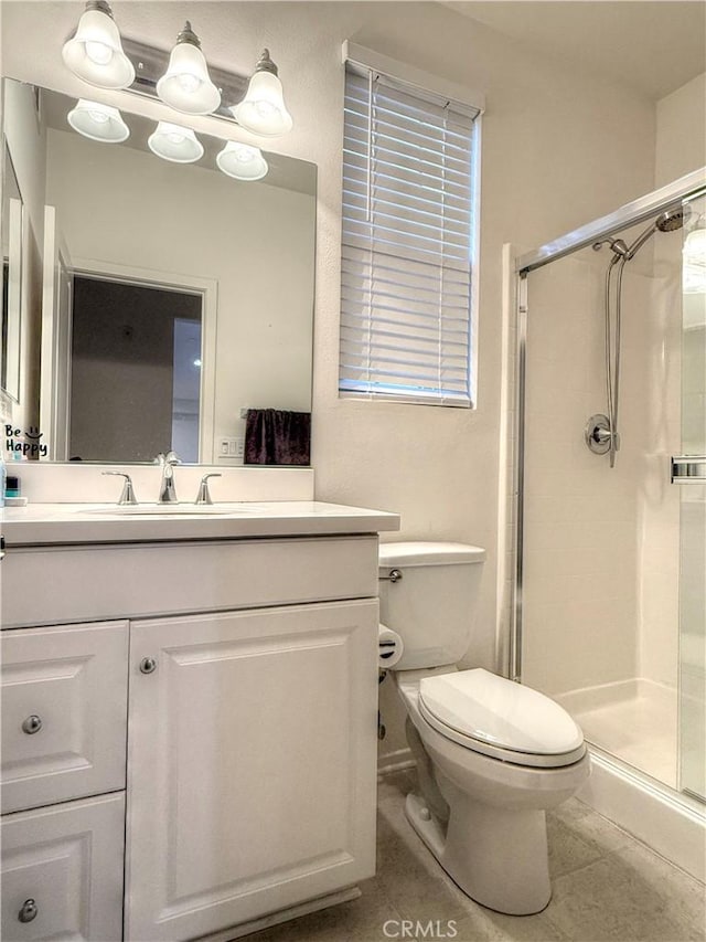 867 E Prommenade Unit B, Azusa, CA 91702 - bathroom featuring a stall shower, vanity, and tile patterned flooring