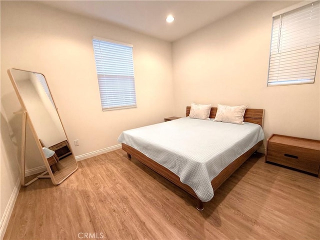 867 E Prommenade Unit B, Azusa, CA 91702 - bedroom featuring light wood-style floors and recessed lighting