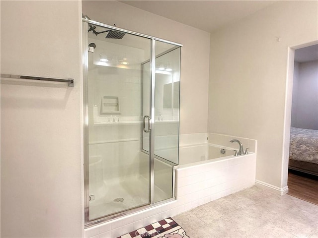 867 E Prommenade Unit B, Azusa, CA 91702 - ensuite bathroom with a shower stall and a garden tub