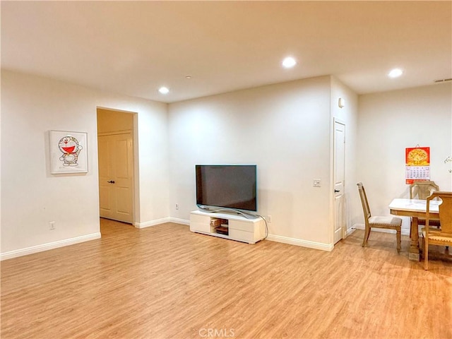 867 E Prommenade Unit B, Azusa, CA 91702 - living room with light wood-type flooring and recessed lighting