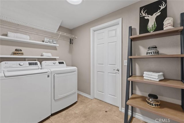 982 Big Spring Ct, Corona, CA 92878 - laundry area with independent washer and dryer and baseboards