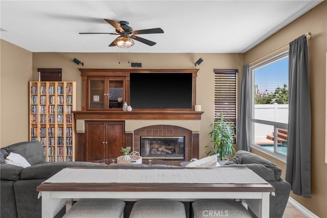 982 Big Spring Ct, Corona, CA 92878 - living area with ceiling fan and a tiled fireplace