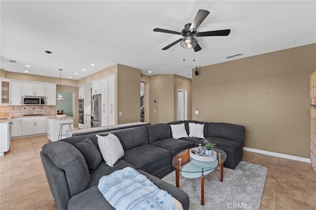 982 Big Spring Ct, Corona, CA 92878 - living area featuring light tile patterned flooring, a ceiling fan, stairway, and recessed lighting