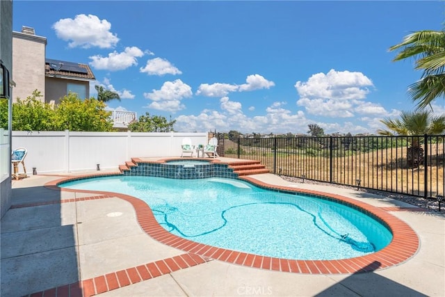 982 Big Spring Ct, Corona, CA 92878 - view of swimming pool featuring a fenced backyard, a patio area, and a pool with connected hot tub