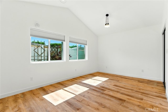 5517 Bevis Ave, Sherman Oaks, CA 91411 - spare room featuring lofted ceiling and wood finished floors