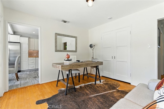 5517 Bevis Ave, Sherman Oaks, CA 91411 - home office featuring light wood-style floors