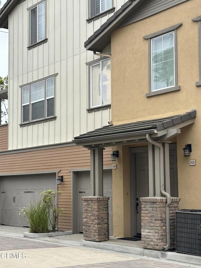 1430 Windshore Way, Oxnard, CA 93035 - view of front of property featuring board and batten siding and an attached garage