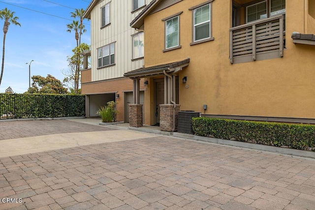 1430 Windshore Way, Oxnard, CA 93035 - multi unit property featuring stucco siding, decorative driveway, and board and batten siding