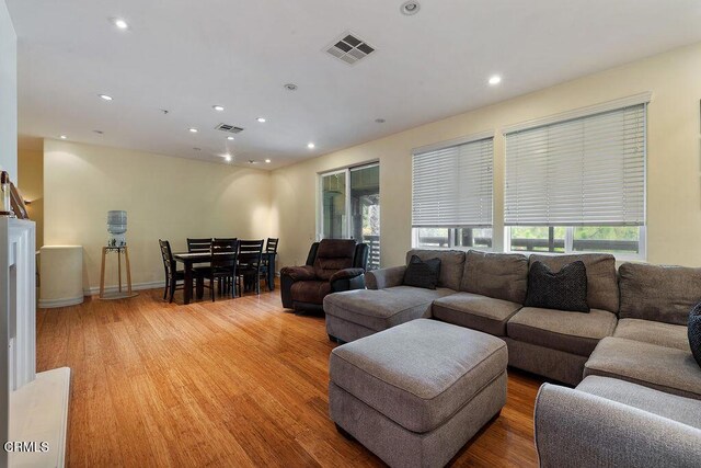 1430 Windshore Way, Oxnard, CA 93035 - living area with recessed lighting and light wood-style floors