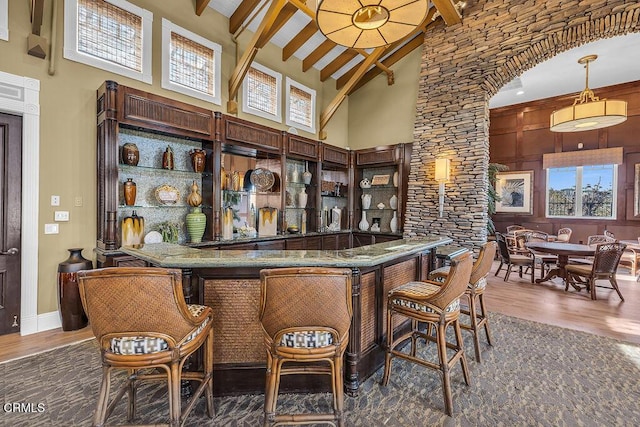 1430 Windshore Way, Oxnard, CA 93035 - indoor wet bar featuring high vaulted ceiling, wood finished floors, beamed ceiling, and hanging light fixtures