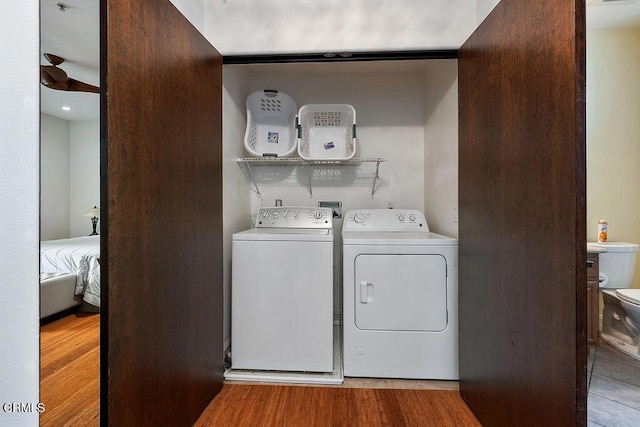 1430 Windshore Way, Oxnard, CA 93035 - laundry room with washing machine and clothes dryer and light wood finished floors