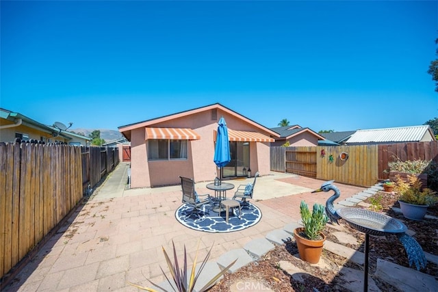 158 Colt Ln, Nipomo, CA 93444 - fenced backyard with a patio