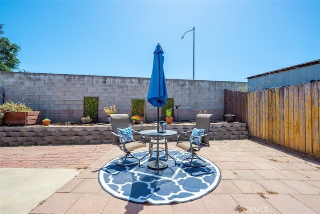 158 Colt Ln, Nipomo, CA 93444 - fenced backyard featuring a patio area